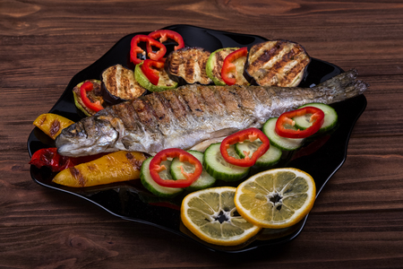 grilled trout with vegetablesの写真素材