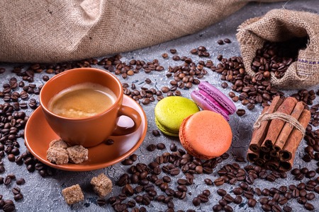 Coffee cup with coffee bag on wooden table.の写真素材