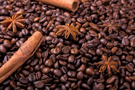 Coffee beans and cinnamon on a background of burlap. ,の写真素材