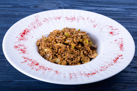 spinach, mushrooms buckwheat on a gray background. toning. selective Focusの写真素材