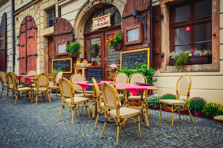 Outdoor cafe In Prague, there are tables on the streetの写真素材