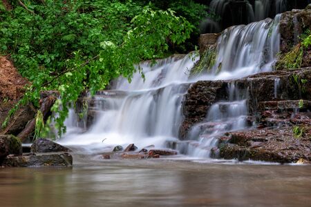 Mountain river waterfall landscape. Cascade of Dzhurynskyi waterfall.の写真素材
