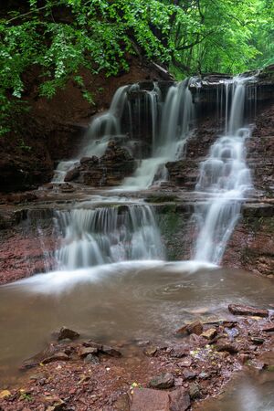 Mountain river waterfall landscape. Cascade of Dzhurynskyi waterfall.の写真素材