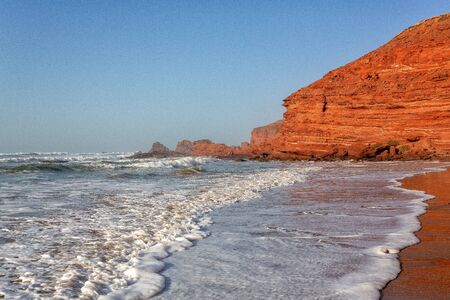 Red archs on atlantic ocean coast. Maroccoの写真素材