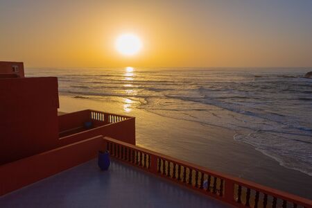 Red archs on atlantic ocean coast. Maroccoの写真素材