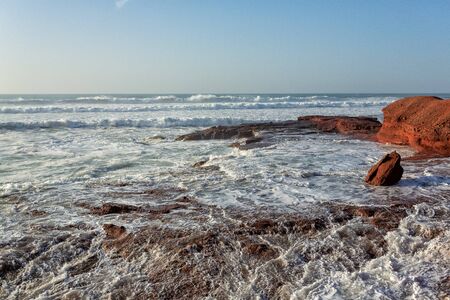 Red archs on atlantic ocean coast. Maroccoの写真素材