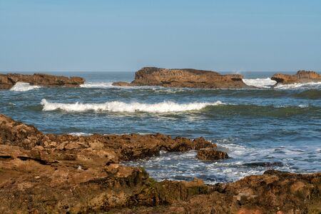 Red archs on atlantic ocean coast. Maroccoの写真素材