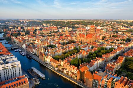 Gdansk is a city in Poland. Gdansk in the morning rays, the sun is reflected from the roofs of the old city.の写真素材
