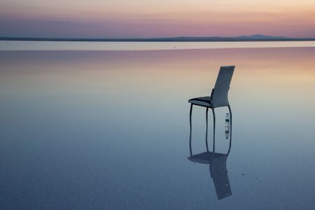 Salt lake Konya Turkey. A man watching farの写真素材