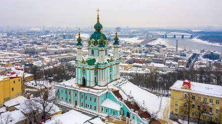 St. Andrews Church and Andriyivskyy Descent, in winter, Kyiv, Ukraineの写真素材