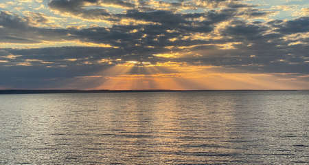 Fantastic colored sunset over the seaの写真素材