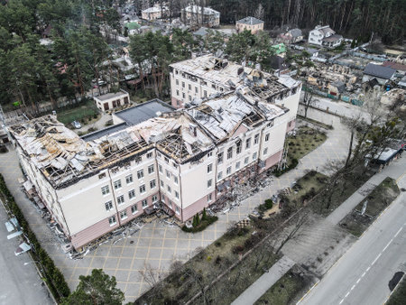 BUCHA, UKRAINE,War in Ukraine. Russian army damaged dwelling house in Bucha, Kyiv Region on March 2022. After bombing.のeditorial素材