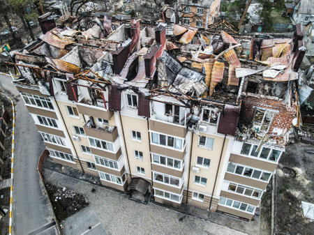 BUCHA, UKRAINE,War in Ukraine. Russian army damaged dwelling house in Bucha, Kyiv Region on March 2022. After bombing.のeditorial素材