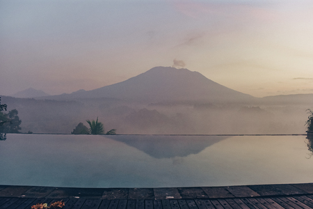 series travels. beautiful view on fantastic volcano Agung in Bali from swimming poolの写真素材
