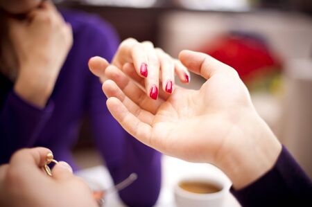 the guy takes his girlfriend s hand and is going to put a wedding ring on his finger. Marriage Proposal Conceptの写真素材