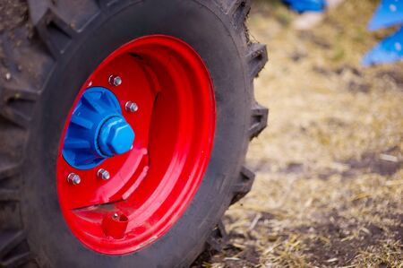 tractor wheel on the field close-up, agricultural machinery, harvestingの写真素材