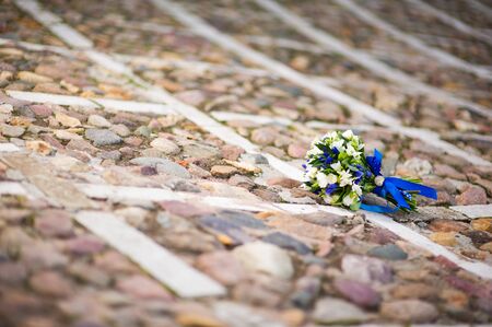 the bride s bouquet lies on the pavement, copy spaceの写真素材