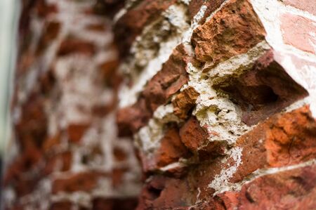 pillar, part of an antique building with a crumbling brick. close upの写真素材