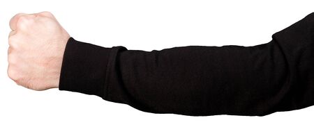 Hand of a young man in a black sleeve clenched into a fist. Isolatedの写真素材