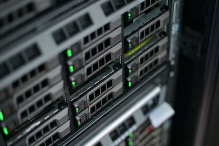 hard drive in a server cabinet. Bokeh and information recording processの写真素材