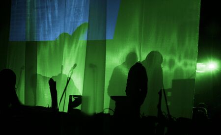 Silhouettes of performance of actors offstageの写真素材