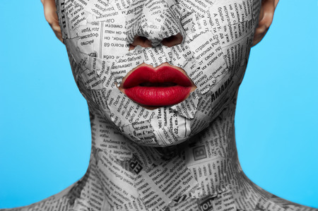 Newspaper on beauty Faceの写真素材