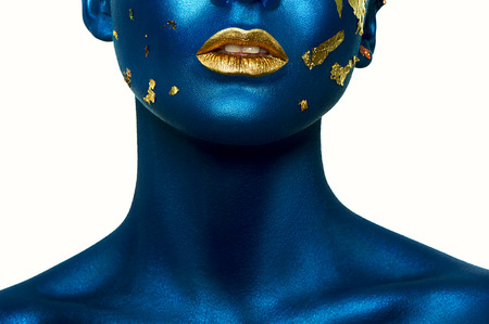 Beauty fashion Girl with blue Skin and gold Lips. Halloween Makeupの写真素材