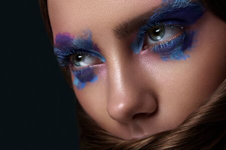 Beauty Woman with blue Eyes, Makeup Face Art and Hairstyleの写真素材