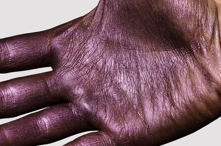 Purple Hand. Shiny Skin Texture for Advertisingの写真素材