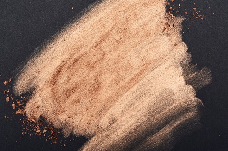 Golden Brush Strokes on black Surfaceの写真素材