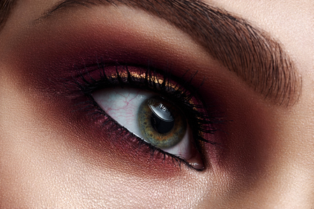 Macro beauty Womans vinous Smoky Eye Make-upの写真素材