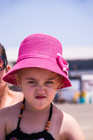Little girl in red coatの写真素材