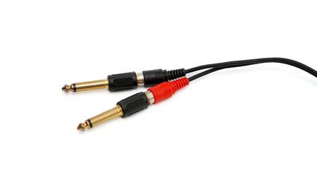 Golden headphone plug with black wire isolated 