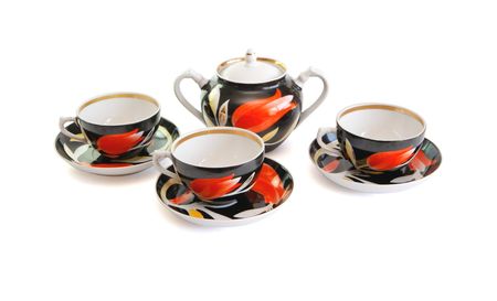 Black tea service consisting of three cups and sugar basin isolated の写真素材