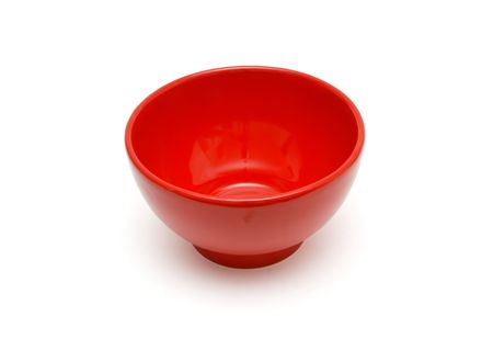 Red porcelain bowl isolated on white backgroundの写真素材