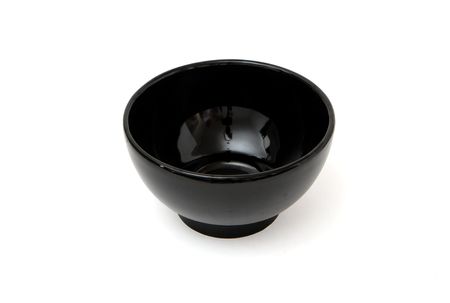 Black porcelain bowl isolated on white backgroundの写真素材