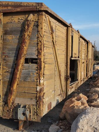 Abandoned wooden railway car on propsの写真素材