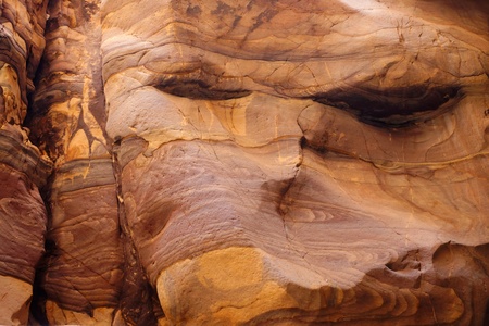 Red striped rock texture in Wadi Mujib canyon in Jordanの写真素材