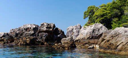 Scenic rocks and sea near Dubrovnik, Croatia on bright summer dayの写真素材
