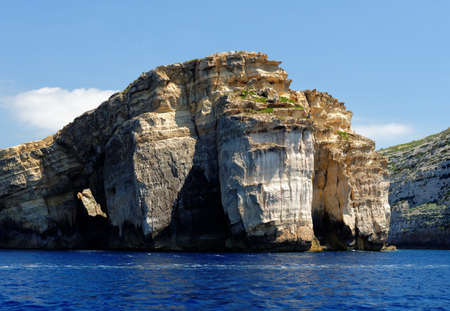 Scenic cliffs of Gozo island in Malta in bright dayの写真素材