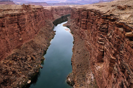 Marble Canyon of Colorado River seen from historic Navajo Bridge in Arizona, USA, on overcast dayの写真素材