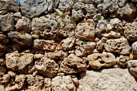 Textured wall of Neolithic megalith temple complex of Ggantija, Gozo island, Maltの写真素材