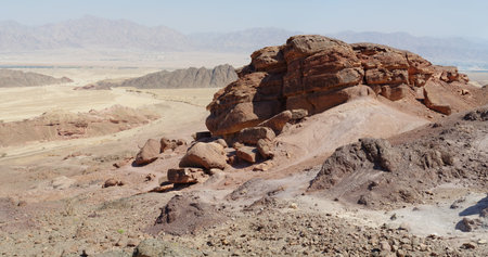 Scenic orange rocks in stone desert near Eilat, Israelの写真素材