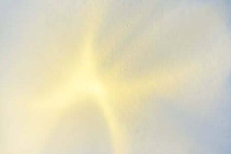 Abstract blurred bright beautiful glitter background. Yellow background. Light on the wall. Shadow...