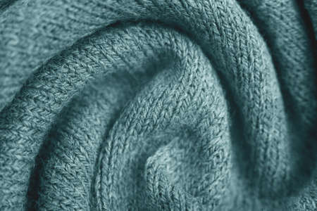 Close up of green knitted textured background. Trendy color.の写真素材
