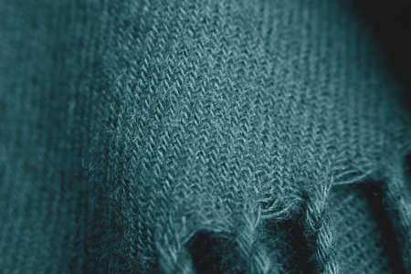 Close up of green knitted textured background. Trendy color.の写真素材