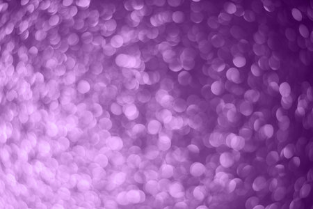An abstract christmas bokeh blurred purple lights background. Trendy color of the year.の写真素材