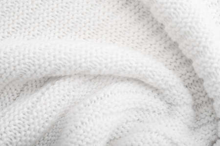 Close up of white knitted textured background.の写真素材