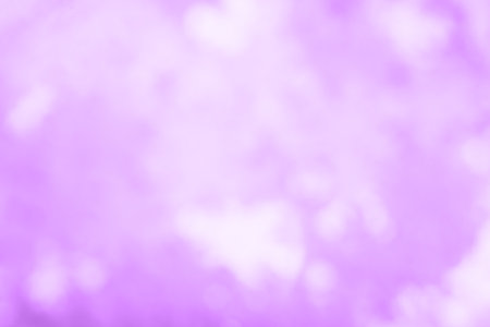 Abstract blurred light glitter background. Bright and colorful background.の写真素材