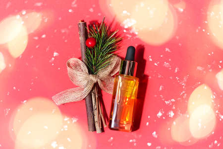 Serum glass bottle with pipette on the beautiful light festive background.の写真素材